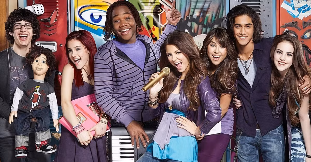 the victorious cast standing in front of lockers.avif